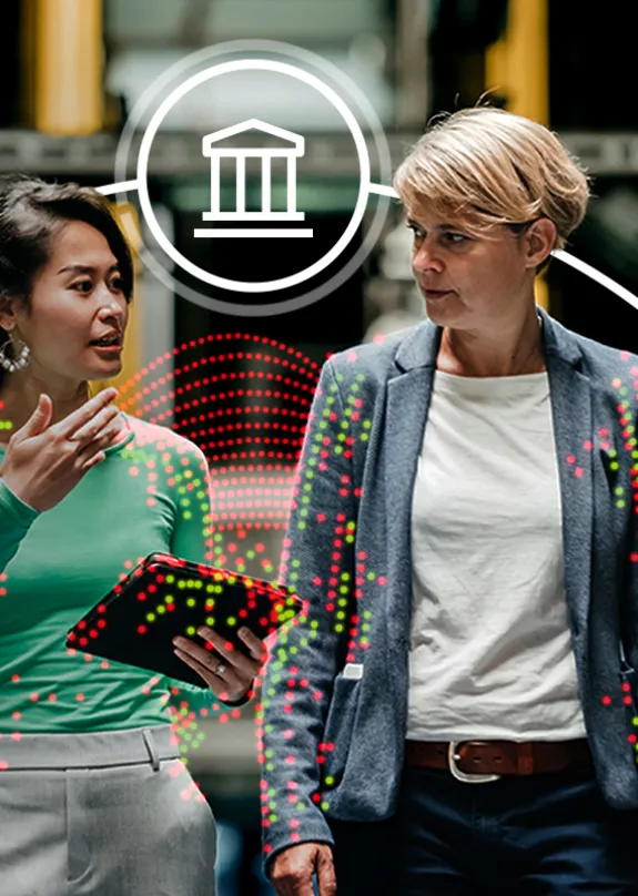 Two woman walking surrounded by eco friendly icons